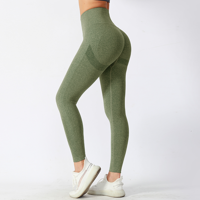 Pantalones de yoga ajustados de cintura media con tela de alto rendimiento que absorbe la humedad