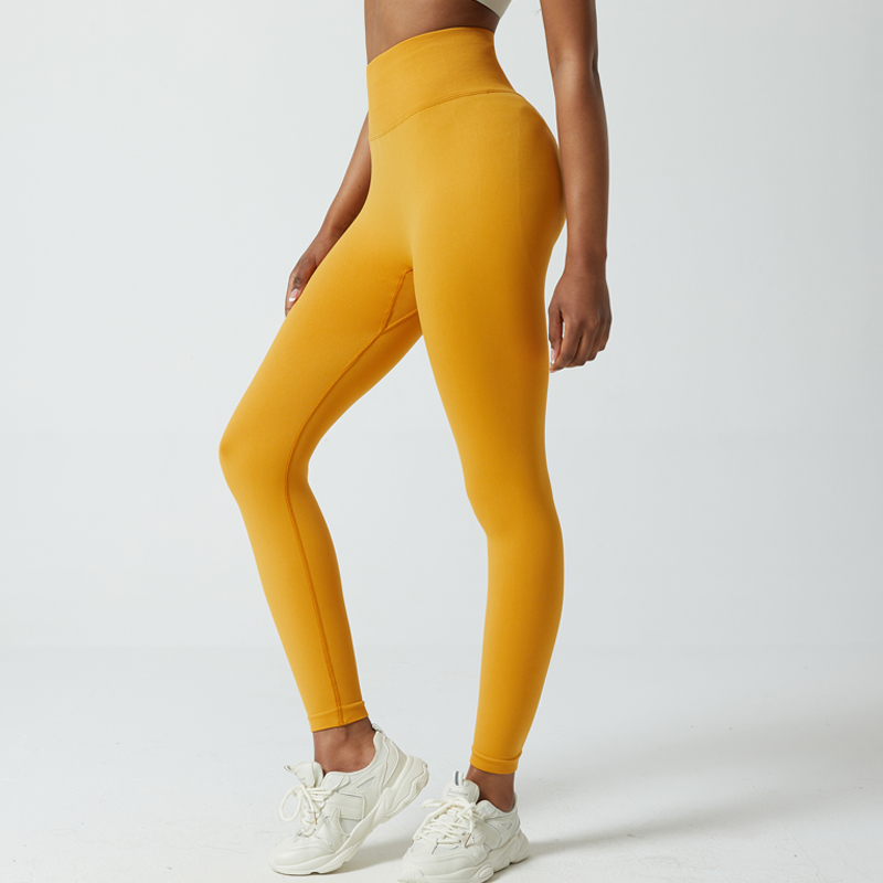 Pantalones de yoga transpirables de cintura media que ofrecen comodidad sin costuras