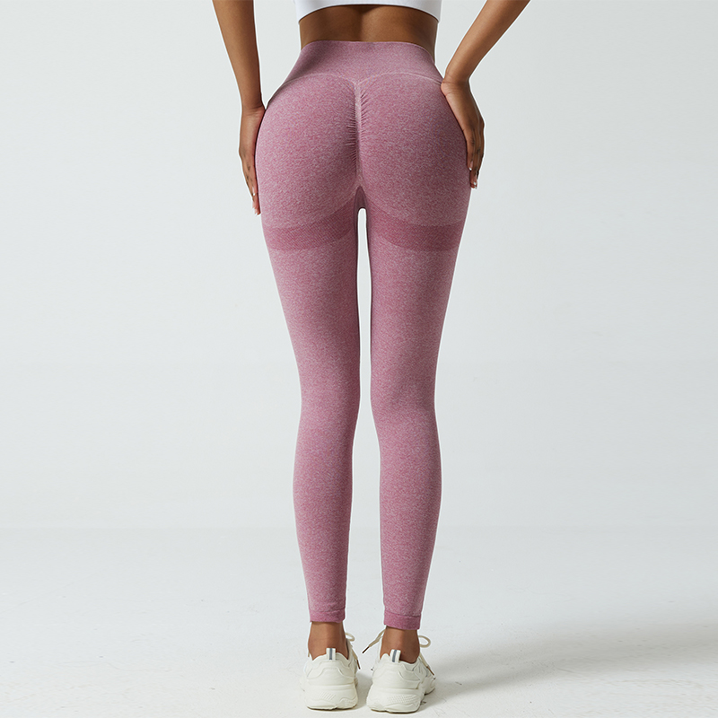 Pantalones de yoga ajustados de cintura media con tela de alto rendimiento que absorbe la humedad